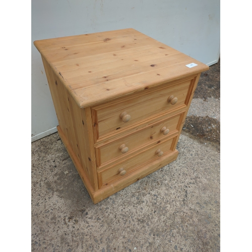 606 - A modern pine 3 drawer chest of drawers