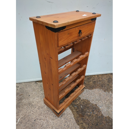 609 - A modern pine wine rack