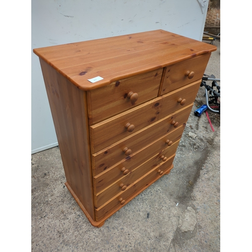 611 - A modern pine 6 drawer chest of drawers