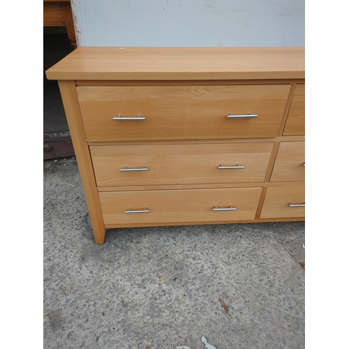 615 - A modern side unit with various cupboard and drawer spaces