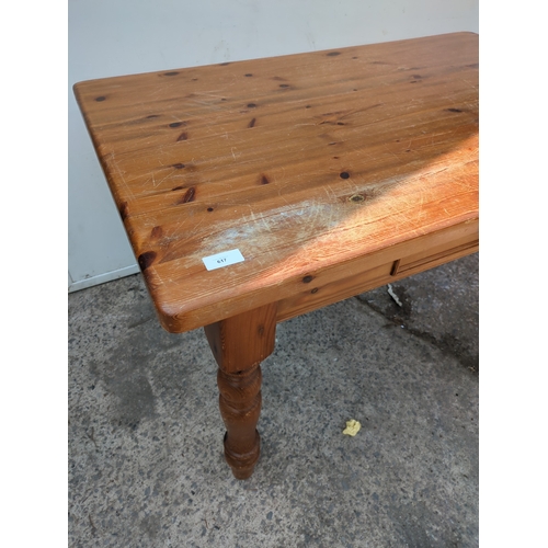 617 - A modern pine dining table