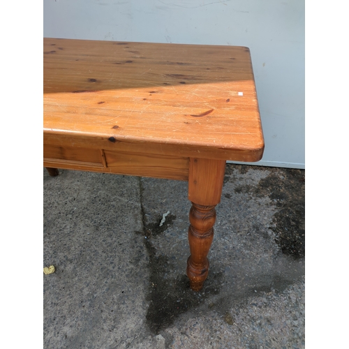 617 - A modern pine dining table