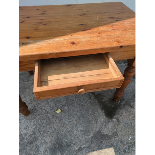 617 - A modern pine dining table