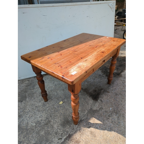 617 - A modern pine dining table