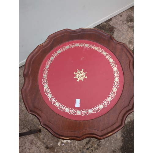 683 - A pair of leather topped mahogany side tables