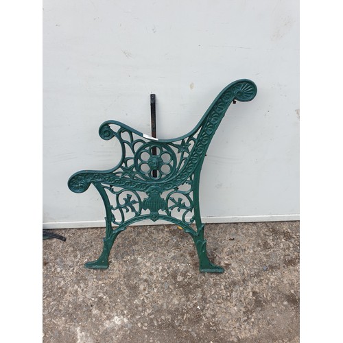 300 - A pair of cast iron bench ends