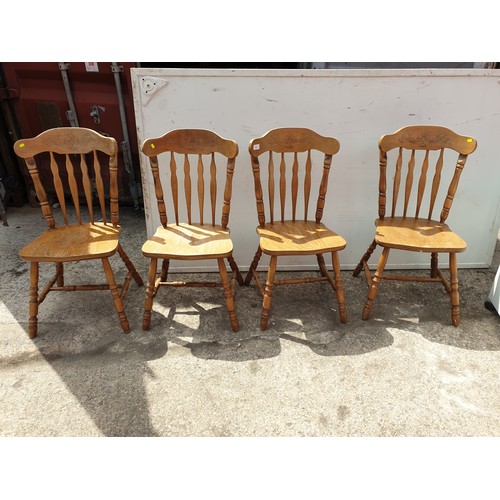 698 - A set of 4 farmhouse style pine dining chairs
