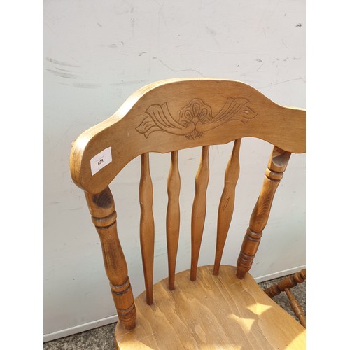 698 - A set of 4 farmhouse style pine dining chairs