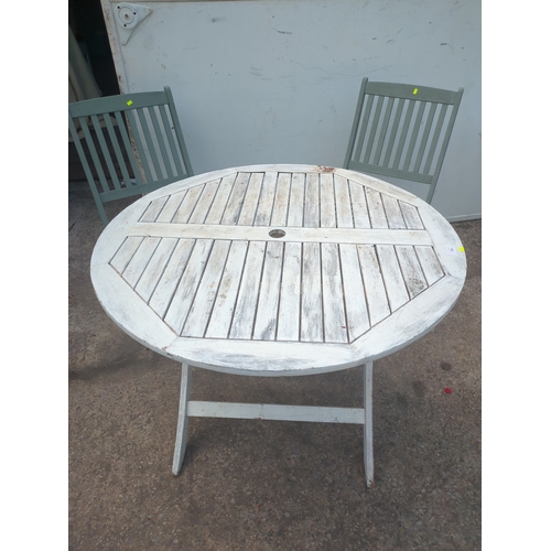 254 - A collapsible pine outdoor table