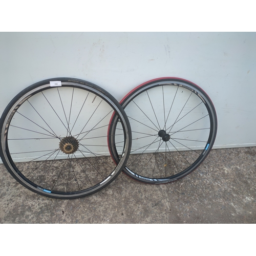 259 - A pair of Shimano road bike wheels