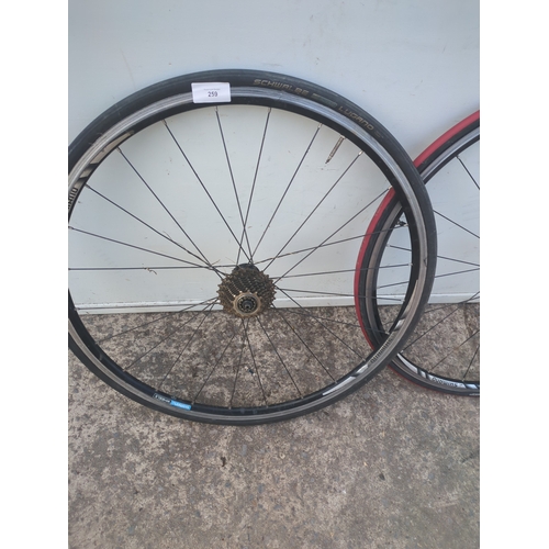 259 - A pair of Shimano road bike wheels