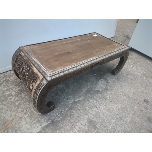 263 - An oriental style carved table