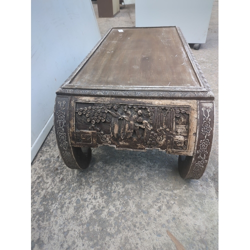 263 - An oriental style carved table