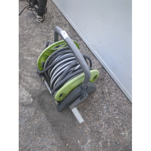 274 - A garden hose on reel