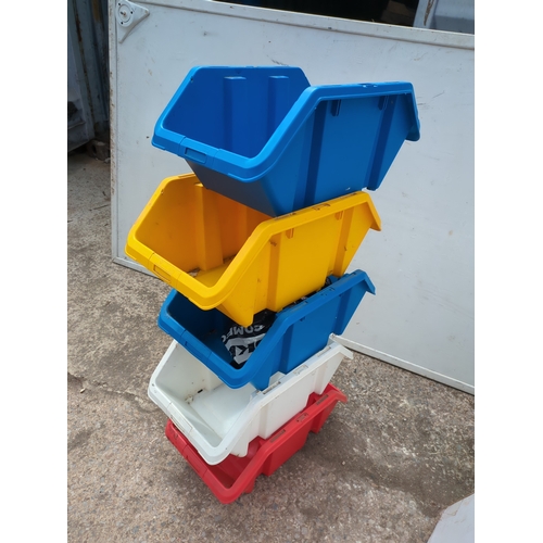 282 - A quantity of stackable plastic storage bins