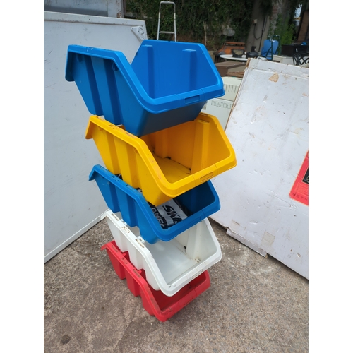 282 - A quantity of stackable plastic storage bins