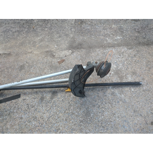 293 - An Elit petrol pole chainsaw and strimmer