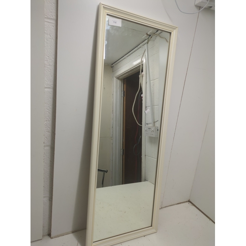 710 - A modern wall hanging mirror