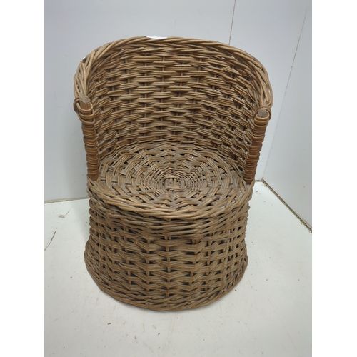 716 - A children's wicker chair