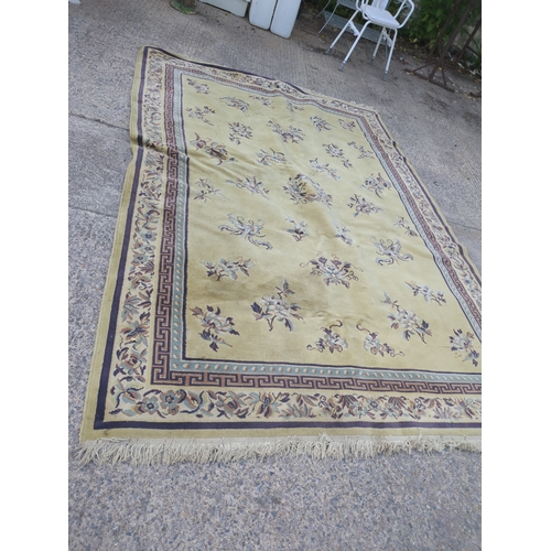720 - A vintage wool area rug - approx 200x286cm