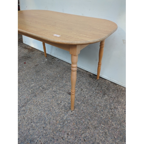 410 - A modern oak effect dining table