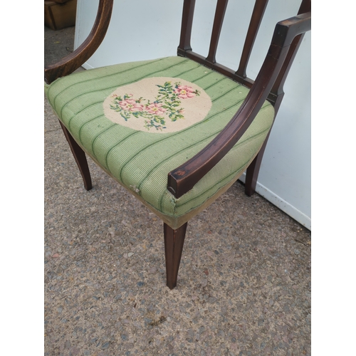 420 - A Victorian mahogany framed hall chair with an embroidered seat base