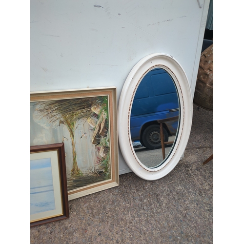 436 - A vintage oval wall mounted mirror