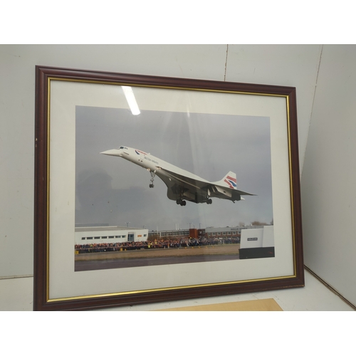 816 - A framed picture of Concorde and a watercolour painting of a landscape