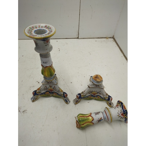 847 - A pair of Italian Renaissance ceramic candlestick holders - damage repaired on both