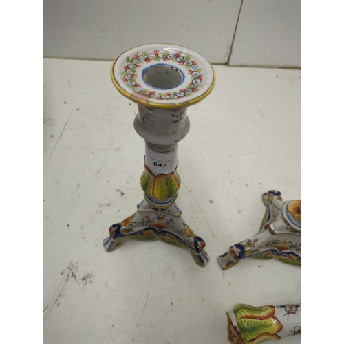 847 - A pair of Italian Renaissance ceramic candlestick holders - damage repaired on both