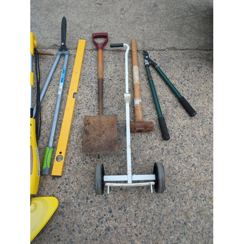22 - A selection of garden tools and equipment