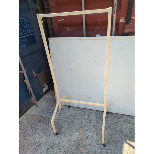 27 - A retro angular clothes rail on casters