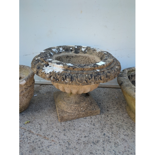 31 - A pair of concrete garden planters