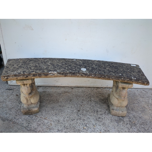 33 - A concrete curved garden bench