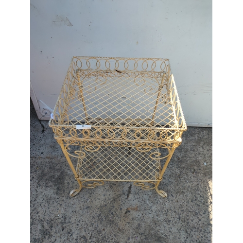 35 - A wrought iron wheeled trolley