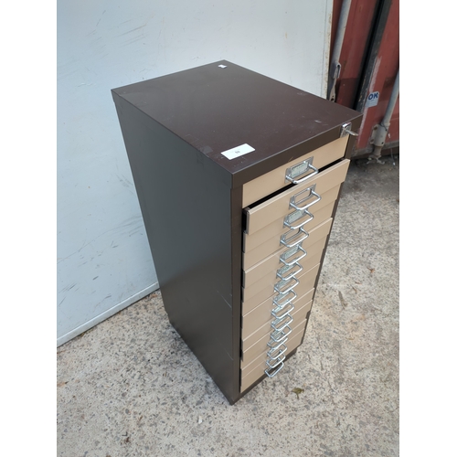 50 - A metal 15 drawer filing cabinet