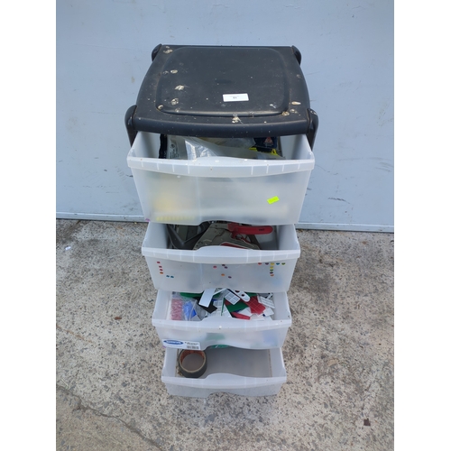 51 - A 4 drawer unit with contents