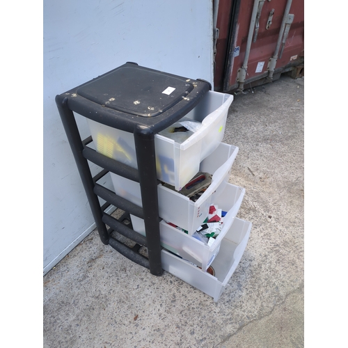 51 - A 4 drawer unit with contents