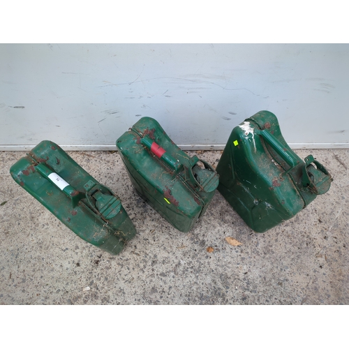 54 - A trio of metal Jerry cans