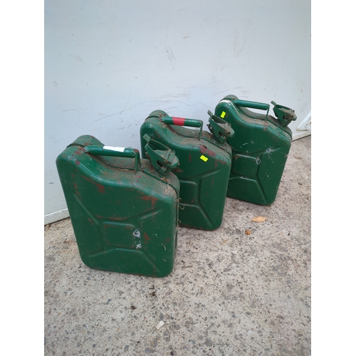 54 - A trio of metal Jerry cans