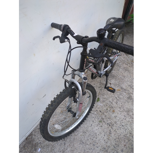 13 - An Apollo fs20 full suspension children's mountain bike