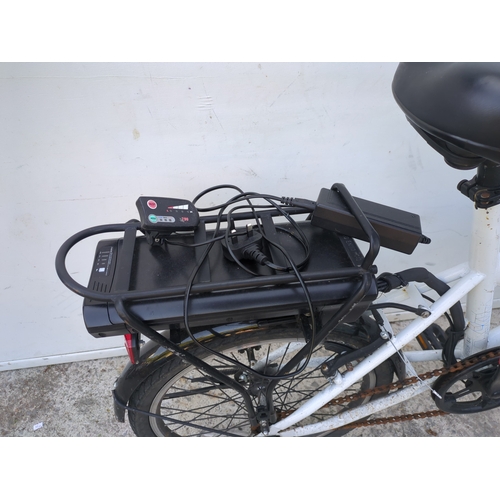 15 - An assist electric bike with charger - no battery