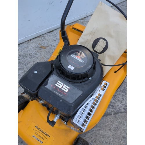 21 - A McCulloch 3540p0 petrol lawn mower with a Briggs and Stratton 35 classic engine - running