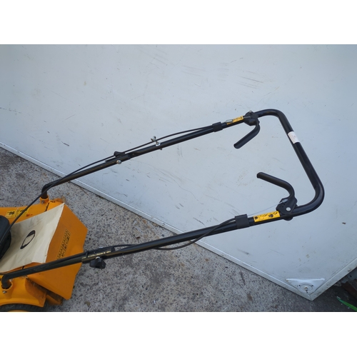 21 - A McCulloch 3540p0 petrol lawn mower with a Briggs and Stratton 35 classic engine - running