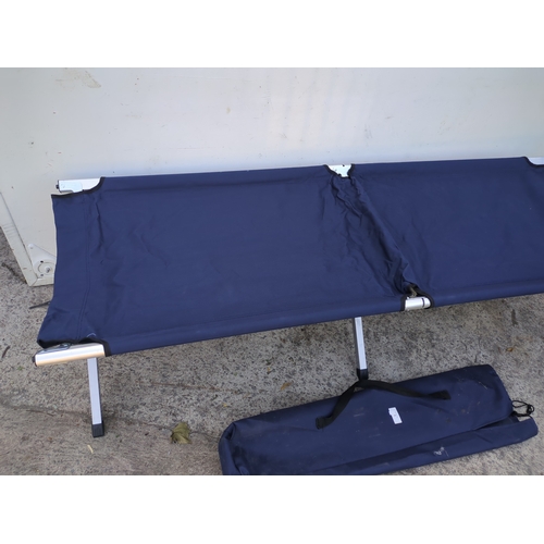 4 - A collapsible camping bed