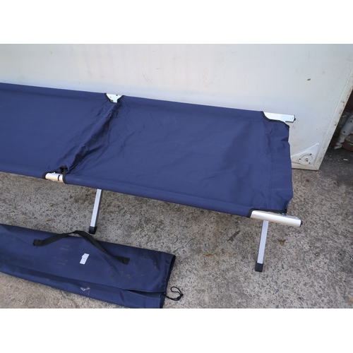 4 - A collapsible camping bed