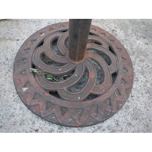 42 - A cast iron garden parasol