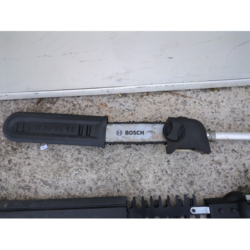43 - A Bosch corded pole chainsaw and hedge trimmer - working