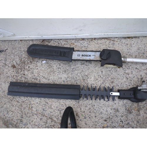 43 - A Bosch corded pole chainsaw and hedge trimmer - working