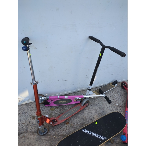 45 - A selection of children's scooters and skateboards
